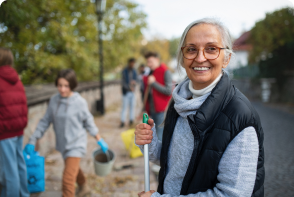 Older female volunteer smiling